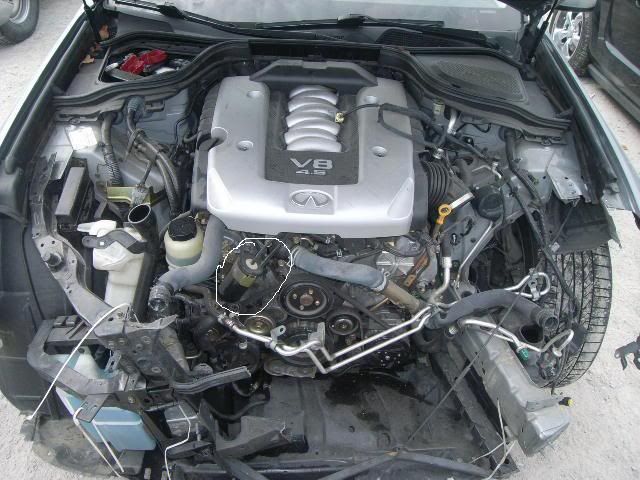 whats missing from this engine area minus the engine covers? - Nissan
