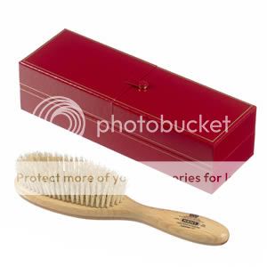 The classic designed oval brush features the Kent logo and the 